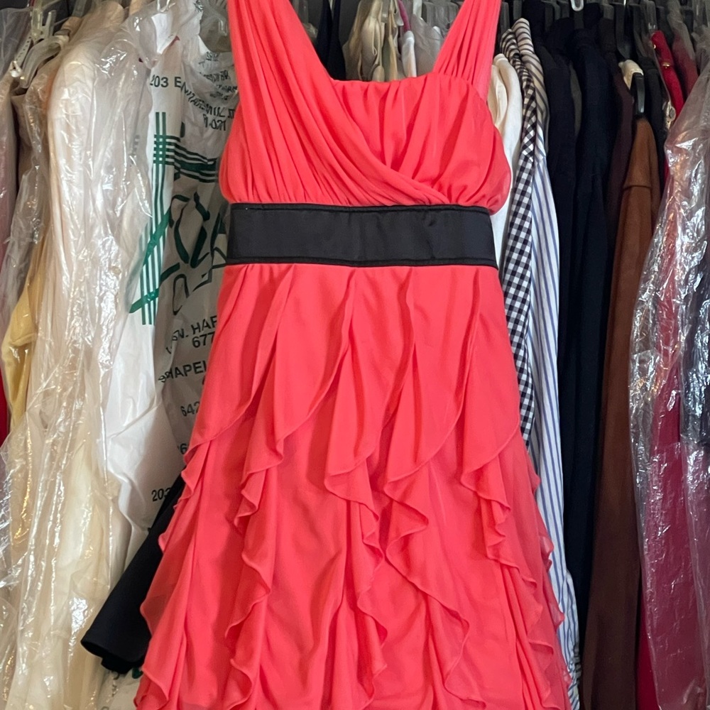 Girls Twirly dress In a beautiful deep salmon color